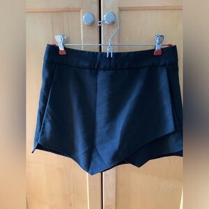 AQUA Asymmetrical Black Skort Size Medium (like new)